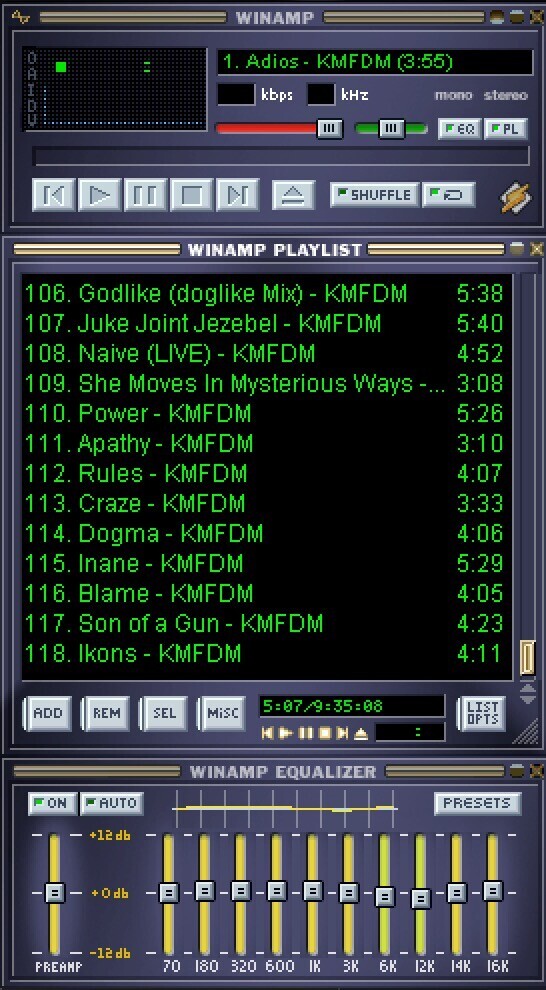 A screenshot of my desktop showing the old 90s-era Winamp mp3 player, my current music player of choice. All of the songs are by KMFDM and came out at least twenty years ago.