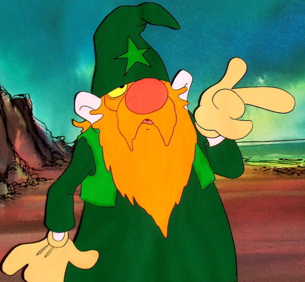 A cartoon wizard in a green hat and green clothes. He has a pointed hat and a round red nose, making him look not unlike the Java character.