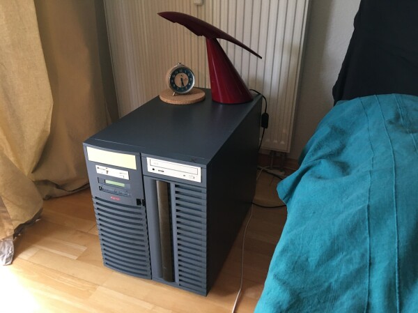 lamp and clock are now placed on an digital Alphaserver 1200, a dark blue metal box with some front-side elements in the wrong colour.