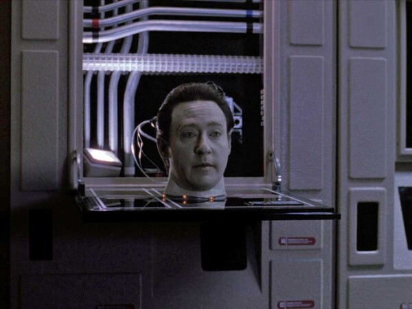 Commander Data in the TNG episode "Disaster" when he has head removed. His head is sitting on a console observing something and he has wires coming out of the back of it