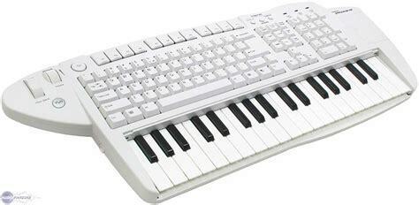 a keboard with a midi keyboard on top and a computer keyboard on the bottom